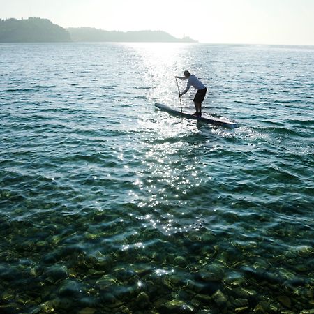 Hotel Slovenija - Terme & Wellness Lifeclass Порторож Екстериор снимка Stand-up paddle boarder on Lake Balaton