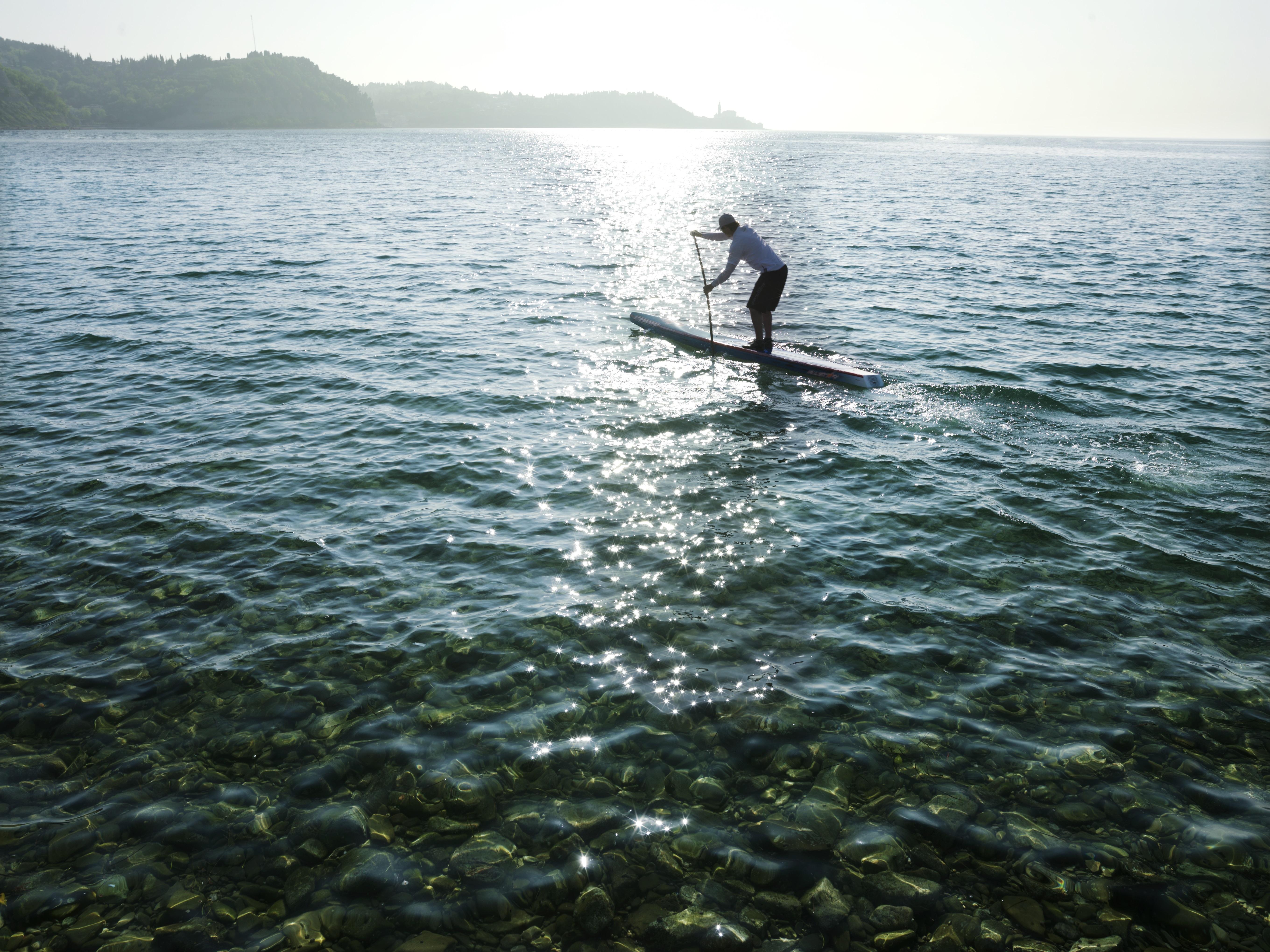Hotel Slovenija - Terme & Wellness Lifeclass Порторож Екстериор снимка Stand-up paddle boarder on Lake Balaton